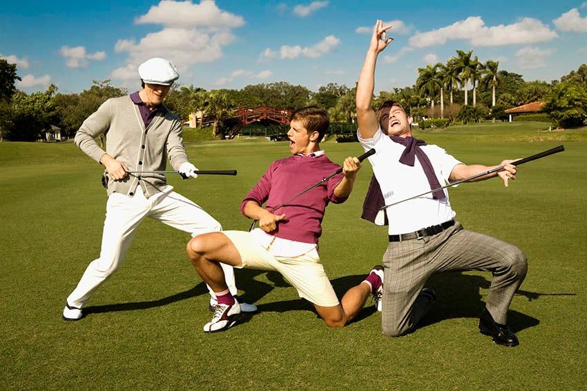 Golfers posing on a course
