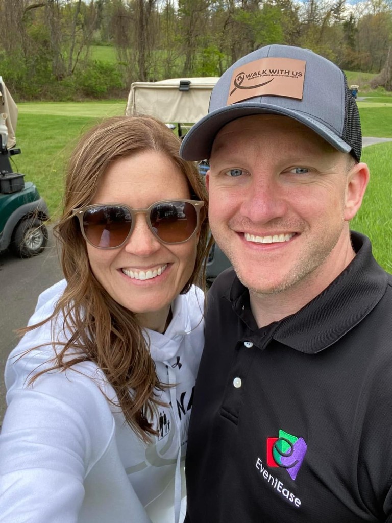 Doug Haines of EventEase with Jamie, founder of Walk With Us, at the golf tournament